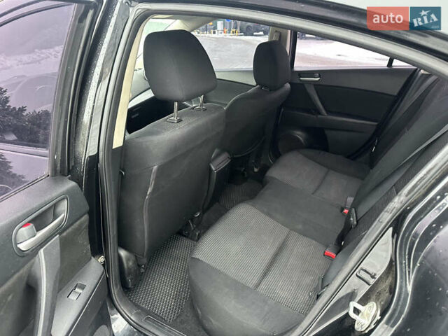 Черный Мазда 3, объемом двигателя 2 л и пробегом 304 тыс. км за 7500 $, фото 16 на Automoto.ua