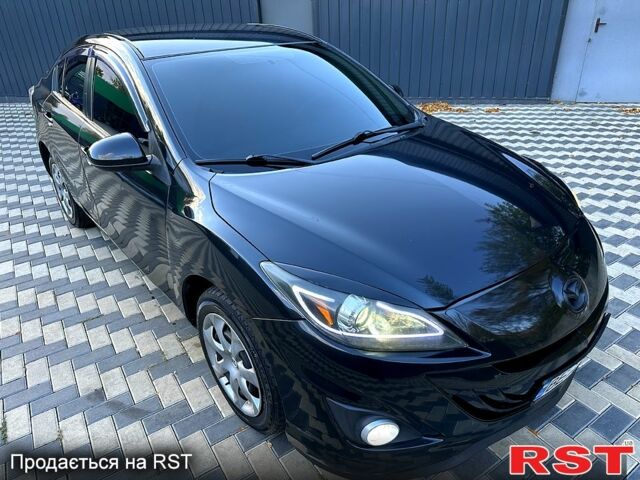 Черный Мазда 3, объемом двигателя 2 л и пробегом 280 тыс. км за 6950 $, фото 7 на Automoto.ua