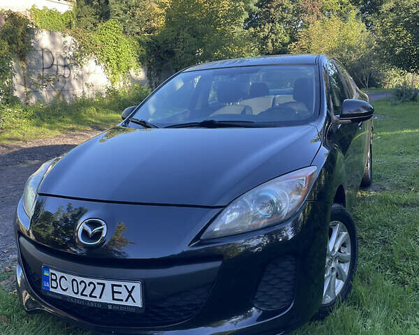 Черный Мазда 3, объемом двигателя 2 л и пробегом 230 тыс. км за 8500 $, фото 4 на Automoto.ua