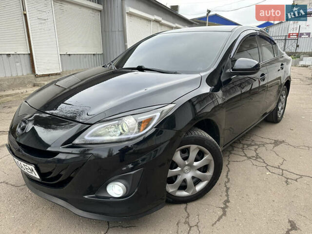 Черный Мазда 3, объемом двигателя 2 л и пробегом 280 тыс. км за 6700 $, фото 1 на Automoto.ua