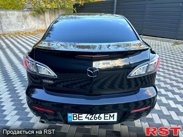 Черный Мазда 3, объемом двигателя 2 л и пробегом 280 тыс. км за 6950 $, фото 4 на Automoto.ua