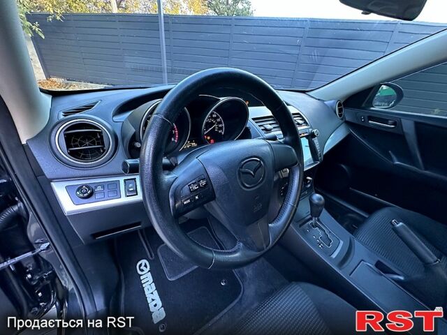 Черный Мазда 3, объемом двигателя 2 л и пробегом 280 тыс. км за 6950 $, фото 10 на Automoto.ua