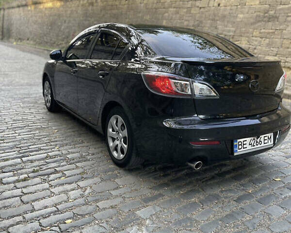 Черный Мазда 3, объемом двигателя 2 л и пробегом 280 тыс. км за 7000 $, фото 8 на Automoto.ua