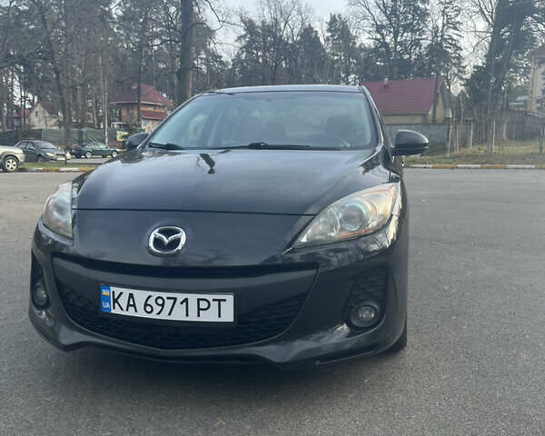 Чорний Мазда 3, об'ємом двигуна 2 л та пробігом 195 тис. км за 7600 $, фото 4 на Automoto.ua