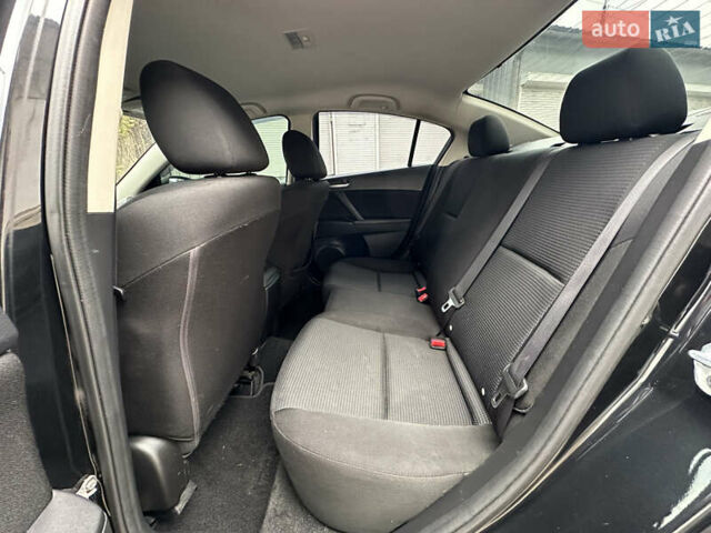 Черный Мазда 3, объемом двигателя 2 л и пробегом 280 тыс. км за 6700 $, фото 26 на Automoto.ua