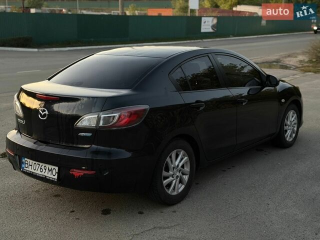 Черный Мазда 3, объемом двигателя 2 л и пробегом 254 тыс. км за 6300 $, фото 6 на Automoto.ua