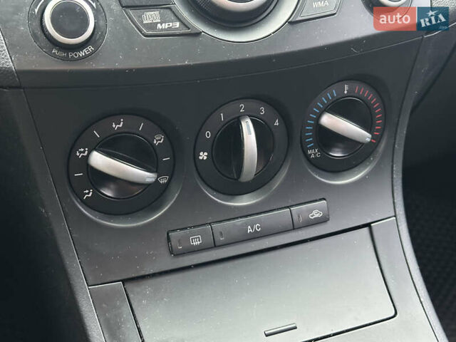 Чорний Мазда 3, об'ємом двигуна 2 л та пробігом 304 тис. км за 7200 $, фото 7 на Automoto.ua