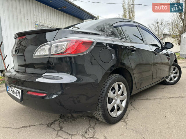 Черный Мазда 3, объемом двигателя 2 л и пробегом 280 тыс. км за 6700 $, фото 9 на Automoto.ua