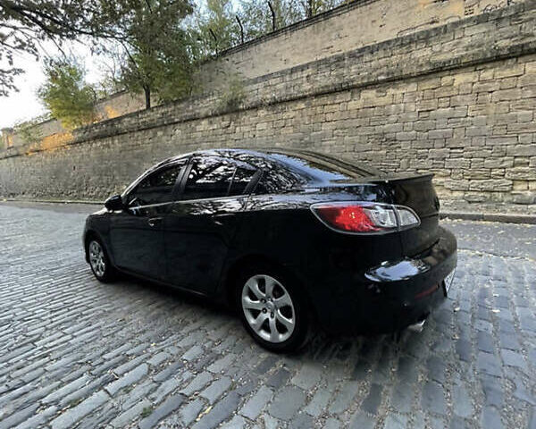 Черный Мазда 3, объемом двигателя 2 л и пробегом 280 тыс. км за 7000 $, фото 9 на Automoto.ua