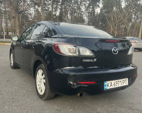 Чорний Мазда 3, об'ємом двигуна 2 л та пробігом 195 тис. км за 7600 $, фото 24 на Automoto.ua