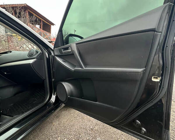 Чорний Мазда 3, об'ємом двигуна 2 л та пробігом 240 тис. км за 7200 $, фото 12 на Automoto.ua