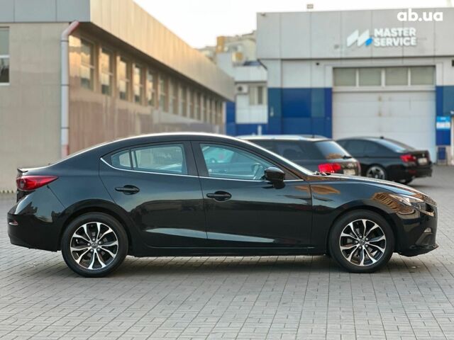 Чорний Мазда 3, об'ємом двигуна 2 л та пробігом 94 тис. км за 10940 $, фото 3 на Automoto.ua