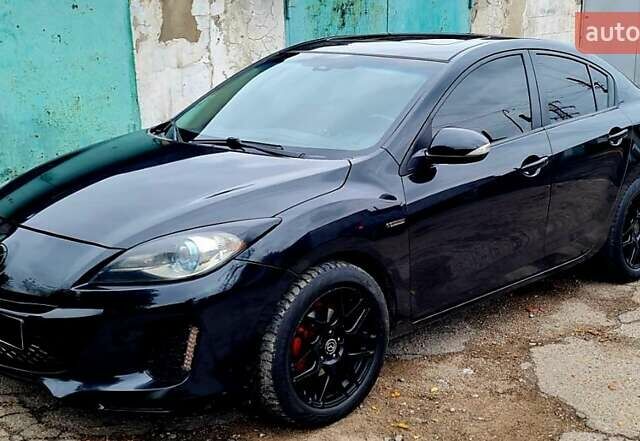 Черный Мазда 3, объемом двигателя 2 л и пробегом 189 тыс. км за 7700 $, фото 2 на Automoto.ua