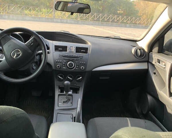 Черный Мазда 3, объемом двигателя 2 л и пробегом 196 тыс. км за 7200 $, фото 12 на Automoto.ua