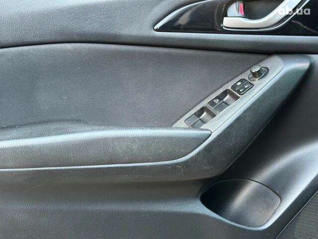 Чорний Мазда 3, об'ємом двигуна 2 л та пробігом 94 тис. км за 10940 $, фото 12 на Automoto.ua