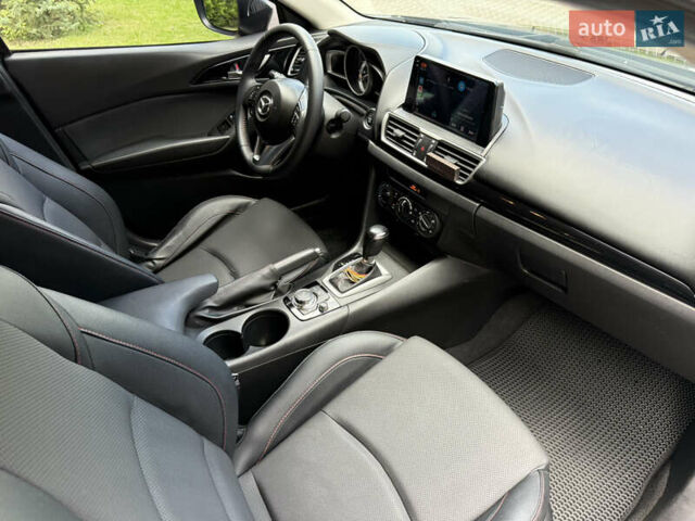 Черный Мазда 3, объемом двигателя 2 л и пробегом 198 тыс. км за 10500 $, фото 16 на Automoto.ua