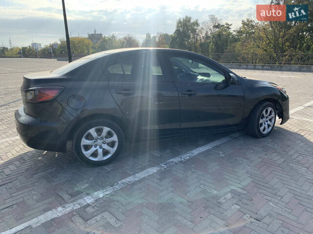 Черный Мазда 3, объемом двигателя 2 л и пробегом 196 тыс. км за 7200 $, фото 6 на Automoto.ua