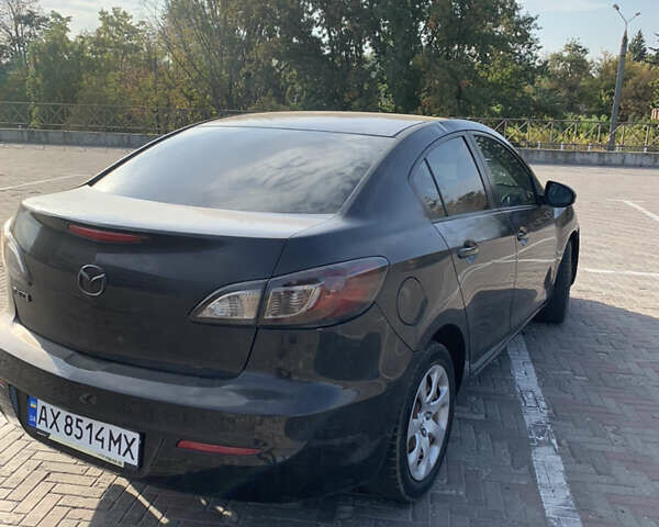 Черный Мазда 3, объемом двигателя 2 л и пробегом 196 тыс. км за 7200 $, фото 7 на Automoto.ua