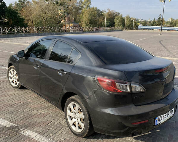 Черный Мазда 3, объемом двигателя 2 л и пробегом 196 тыс. км за 7200 $, фото 10 на Automoto.ua