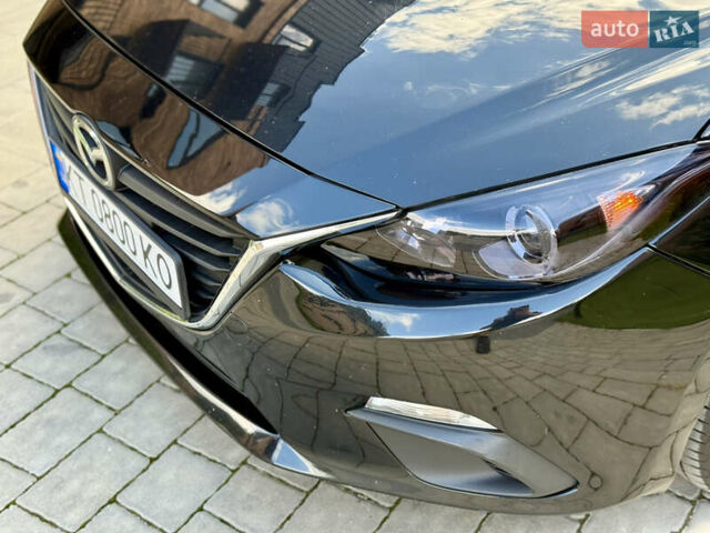 Черный Мазда 3, объемом двигателя 2 л и пробегом 198 тыс. км за 10500 $, фото 3 на Automoto.ua