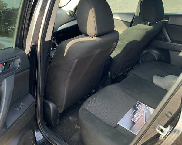 Черный Мазда 3, объемом двигателя 2 л и пробегом 196 тыс. км за 7200 $, фото 11 на Automoto.ua