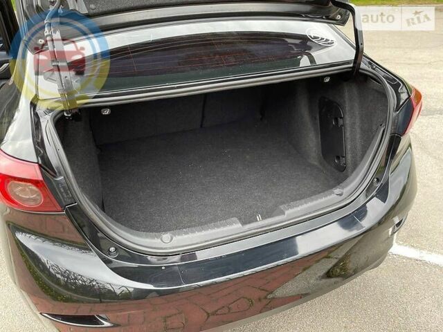 Черный Мазда 3, объемом двигателя 2 л и пробегом 190 тыс. км за 9800 $, фото 15 на Automoto.ua
