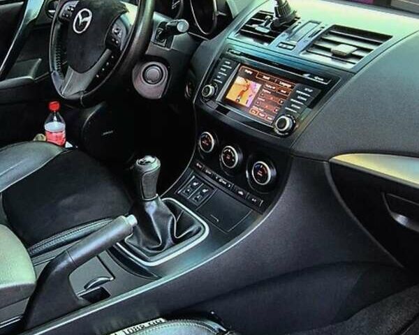 Черный Мазда 3, объемом двигателя 2 л и пробегом 189 тыс. км за 7700 $, фото 4 на Automoto.ua