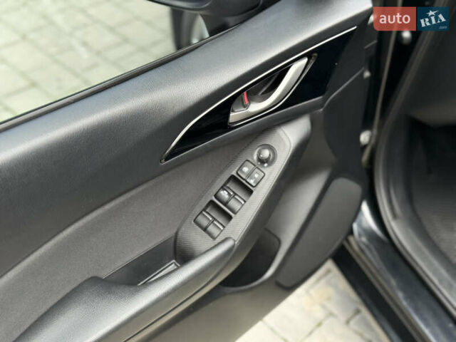 Черный Мазда 3, объемом двигателя 2 л и пробегом 198 тыс. км за 10500 $, фото 15 на Automoto.ua