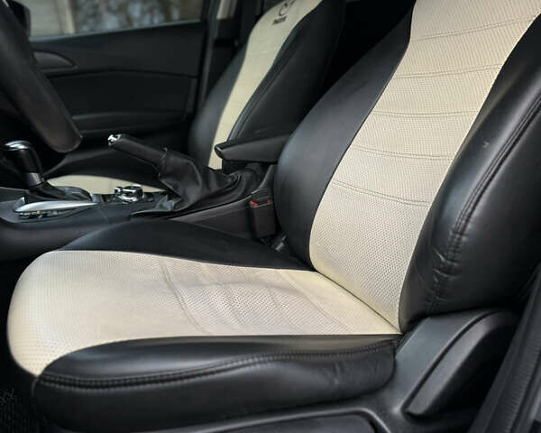 Черный Мазда 3, объемом двигателя 2 л и пробегом 148 тыс. км за 9400 $, фото 18 на Automoto.ua