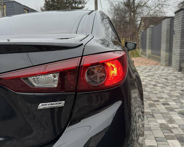 Чорний Мазда 3, об'ємом двигуна 1.5 л та пробігом 143 тис. км за 10900 $, фото 27 на Automoto.ua