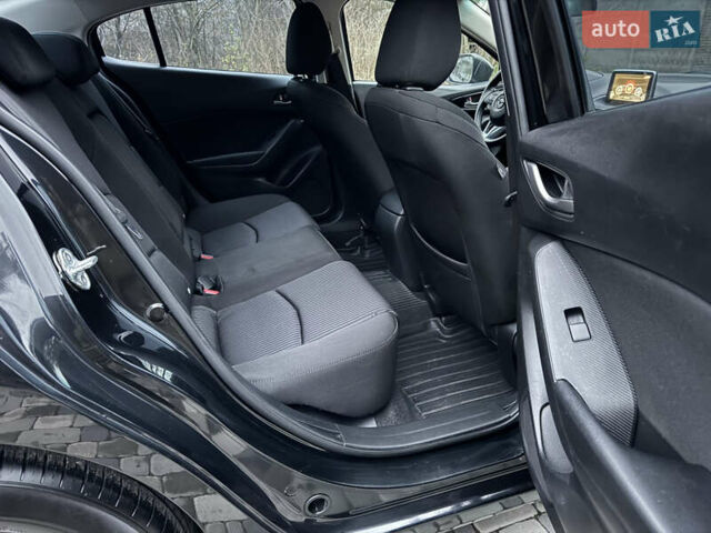 Чорний Мазда 3, об'ємом двигуна 1.5 л та пробігом 143 тис. км за 10900 $, фото 43 на Automoto.ua