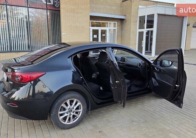 Черный Мазда 3, объемом двигателя 2 л и пробегом 138 тыс. км за 10500 $, фото 11 на Automoto.ua