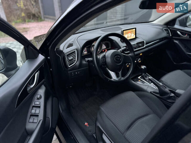 Чорний Мазда 3, об'ємом двигуна 1.5 л та пробігом 143 тис. км за 10900 $, фото 30 на Automoto.ua