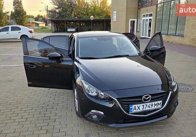 Черный Мазда 3, объемом двигателя 2 л и пробегом 138 тыс. км за 10500 $, фото 10 на Automoto.ua