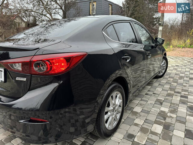 Чорний Мазда 3, об'ємом двигуна 1.5 л та пробігом 143 тис. км за 10900 $, фото 24 на Automoto.ua