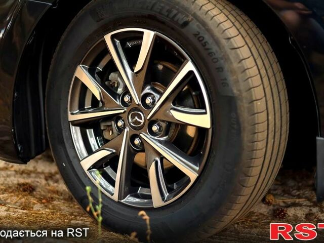 Чорний Мазда 3, об'ємом двигуна 2 л та пробігом 197 тис. км за 9500 $, фото 10 на Automoto.ua