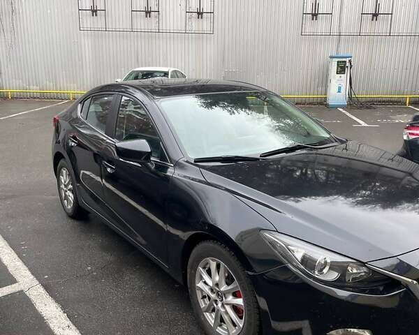 Черный Мазда 3, объемом двигателя 2 л и пробегом 167 тыс. км за 12500 $, фото 4 на Automoto.ua