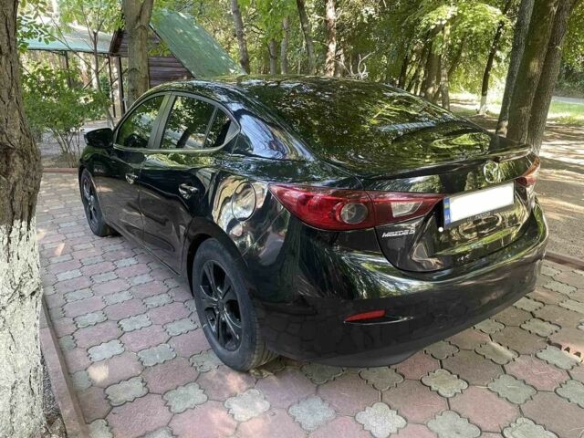 Чорний Мазда 3, об'ємом двигуна 2 л та пробігом 215 тис. км за 9849 $, фото 14 на Automoto.ua