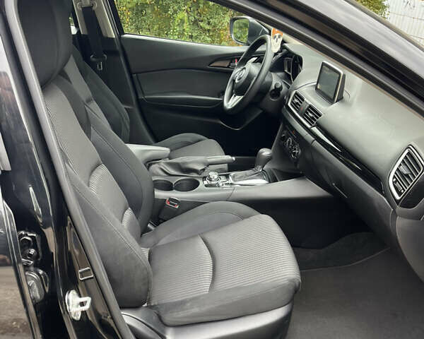 Черный Мазда 3, объемом двигателя 2 л и пробегом 172 тыс. км за 11950 $, фото 13 на Automoto.ua