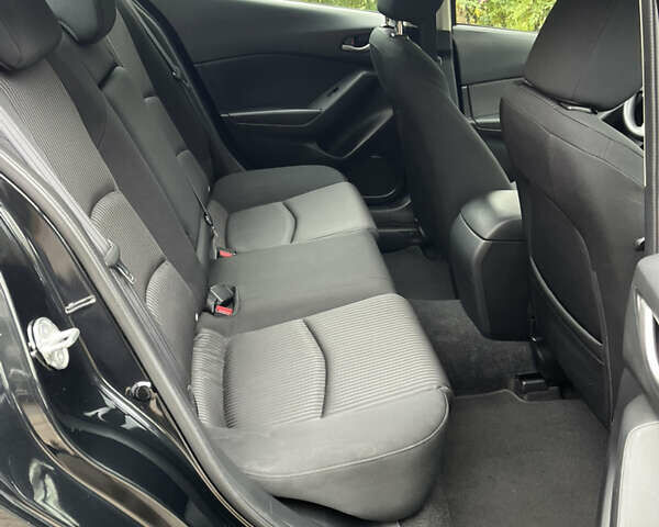 Черный Мазда 3, объемом двигателя 2 л и пробегом 172 тыс. км за 11950 $, фото 14 на Automoto.ua