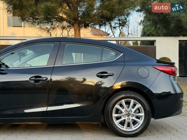 Чорний Мазда 3, об'ємом двигуна 2 л та пробігом 130 тис. км за 11900 $, фото 35 на Automoto.ua