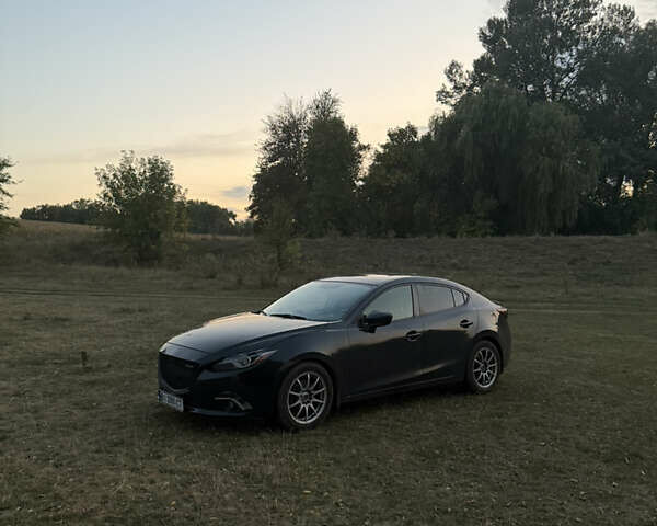Чорний Мазда 3, об'ємом двигуна 2.49 л та пробігом 129 тис. км за 9499 $, фото 4 на Automoto.ua