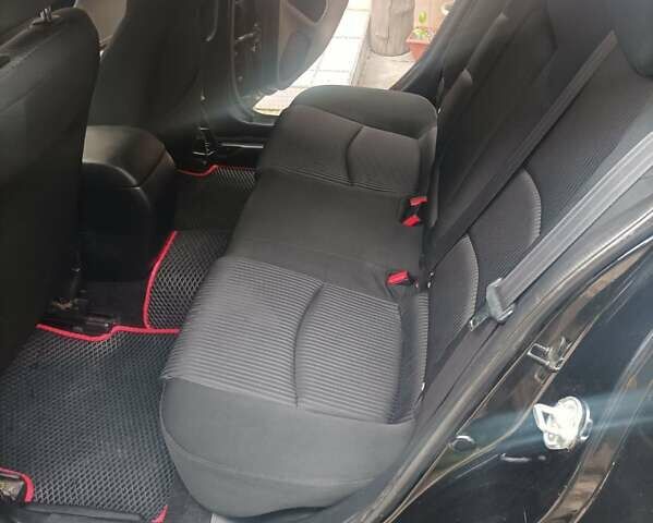 Черный Мазда 3, объемом двигателя 2 л и пробегом 265 тыс. км за 7900 $, фото 10 на Automoto.ua