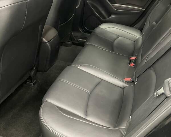 Чорний Мазда 3, об'ємом двигуна 2 л та пробігом 133 тис. км за 13999 $, фото 13 на Automoto.ua