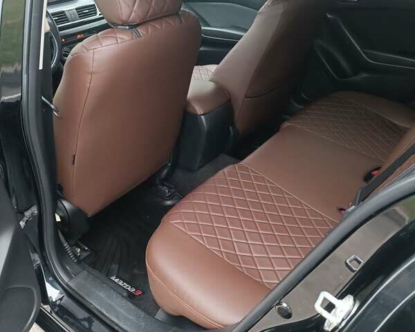 Черный Мазда 3, объемом двигателя 2 л и пробегом 128 тыс. км за 12700 $, фото 23 на Automoto.ua