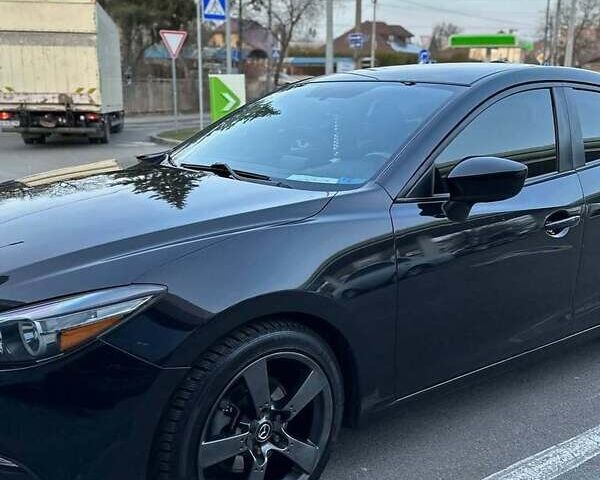 Чорний Мазда 3, об'ємом двигуна 2 л та пробігом 165 тис. км за 10500 $, фото 6 на Automoto.ua