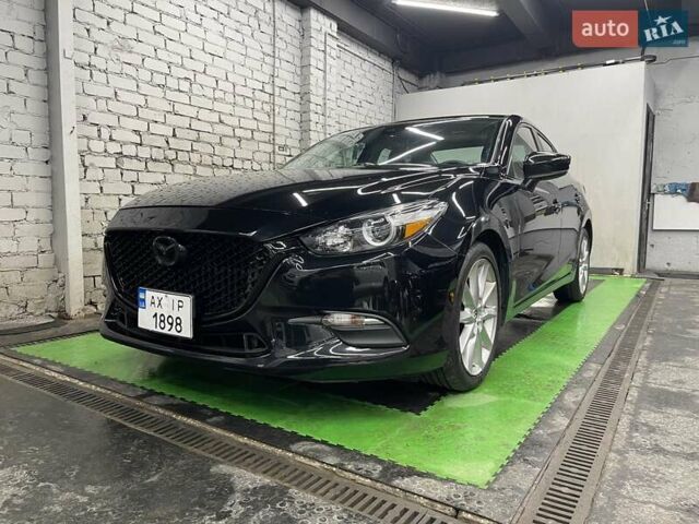 Чорний Мазда 3, об'ємом двигуна 2 л та пробігом 133 тис. км за 13999 $, фото 9 на Automoto.ua