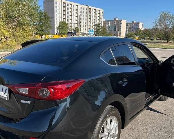 Черный Мазда 3, объемом двигателя 2 л и пробегом 160 тыс. км за 11600 $, фото 9 на Automoto.ua