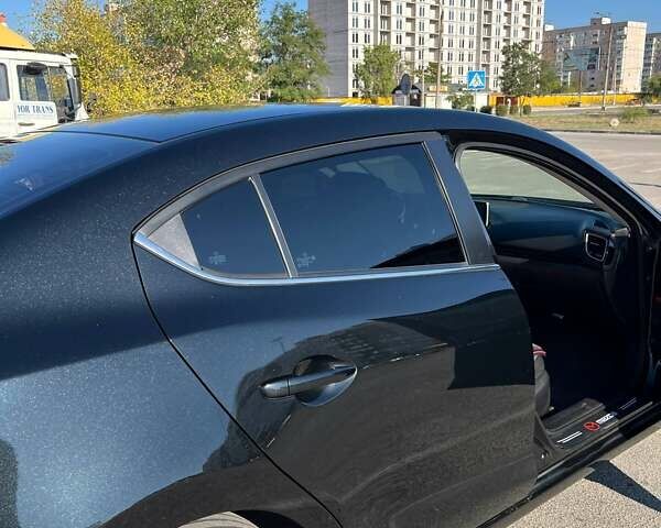 Черный Мазда 3, объемом двигателя 2 л и пробегом 160 тыс. км за 11600 $, фото 10 на Automoto.ua