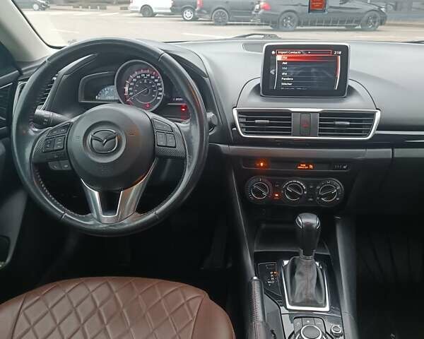 Черный Мазда 3, объемом двигателя 2 л и пробегом 128 тыс. км за 12700 $, фото 17 на Automoto.ua